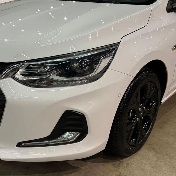 Chevrolet Onix 10tat - foto 8