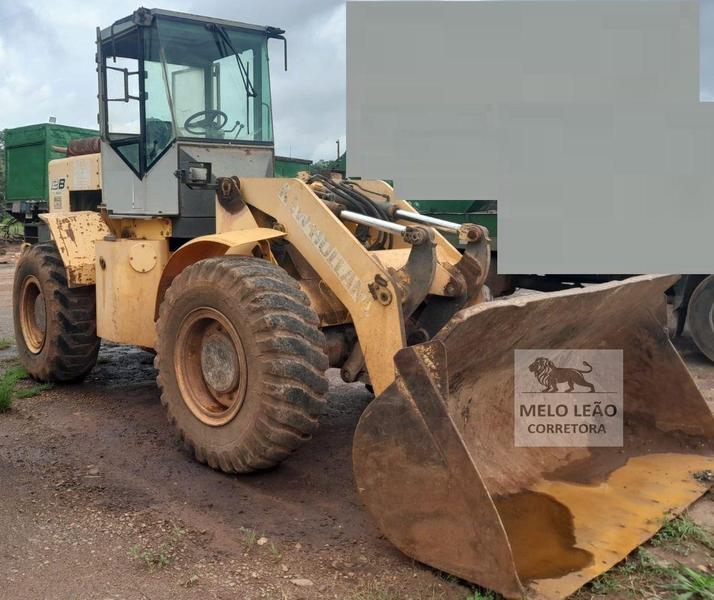 NEW HOLLAND P� CARREGADEIRA 12D