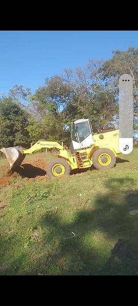 NEW HOLLAND P� CARREGADEIRA 12C