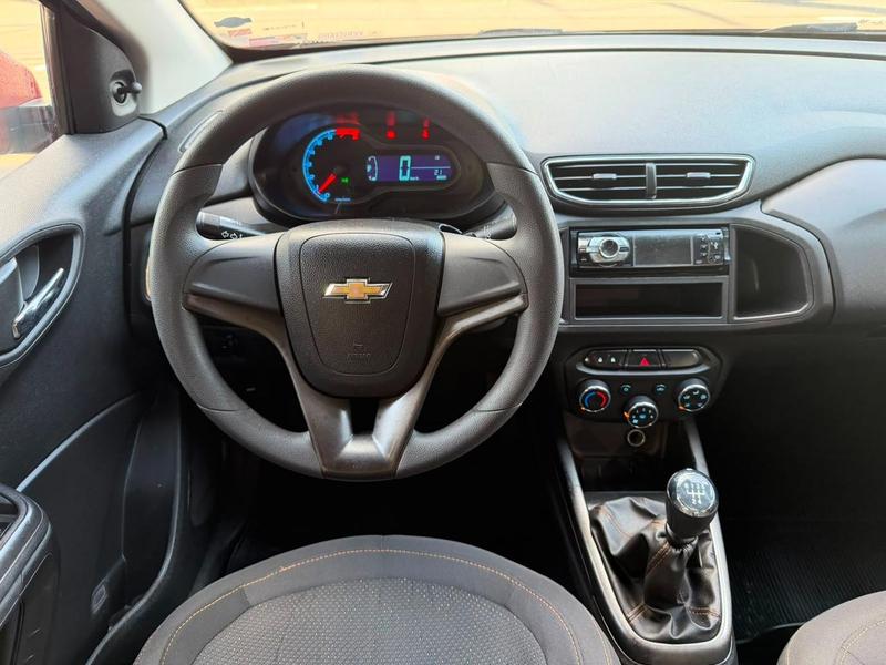 Chevrolet Onix laranja - foto 10