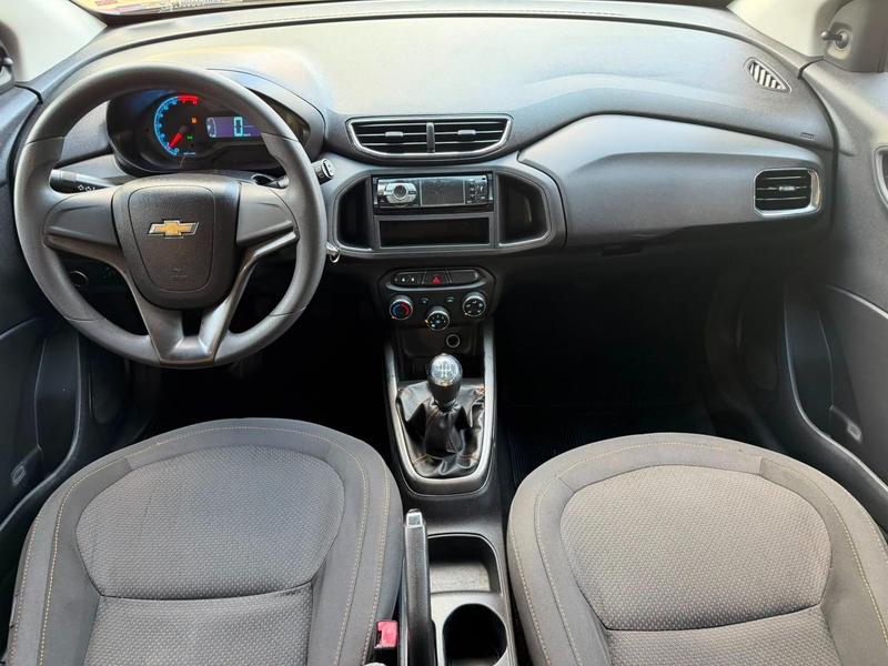 Chevrolet Onix laranja - foto 11