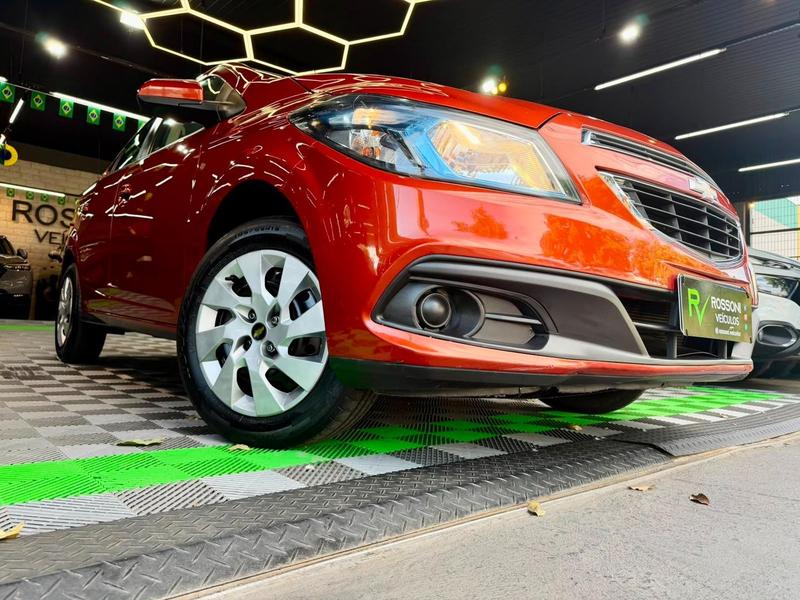Chevrolet Onix laranja - foto 8